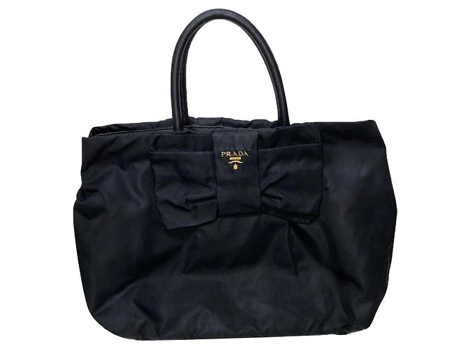 Ribbon Bolso Prada con lazo de nailon negro y asas de piel