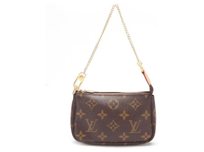 Pochette accessoire cloth mini bag Louis Vuitton Brown in Cloth