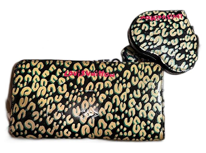 Louis Vuitton Coração de Moeda Zippy Estampa de leopardo Couro envernizado  ref.790631