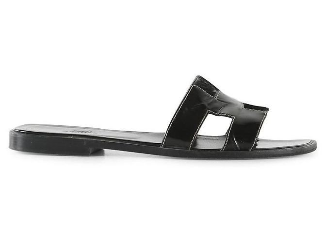 Hermès Hermes Schwarzes Lackleder Oran Flat Slides