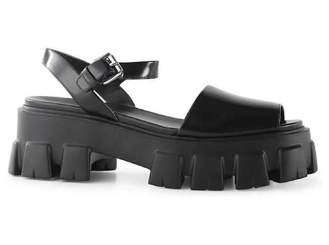 Sandales plates-formes brossées Monolith en cuir noir Prada  ref.792720