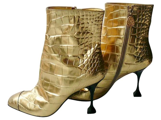 CHANEL Bottines cuir doré impression crocodile T41 TBE  ref.795471