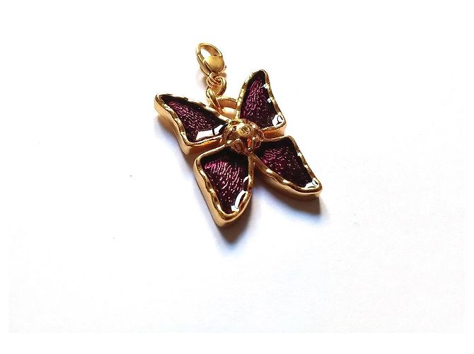 Colar com pingente Yves Saint Laurent roxo e dourado 
