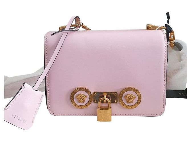 Bolsa de mão Versace em couro rosa