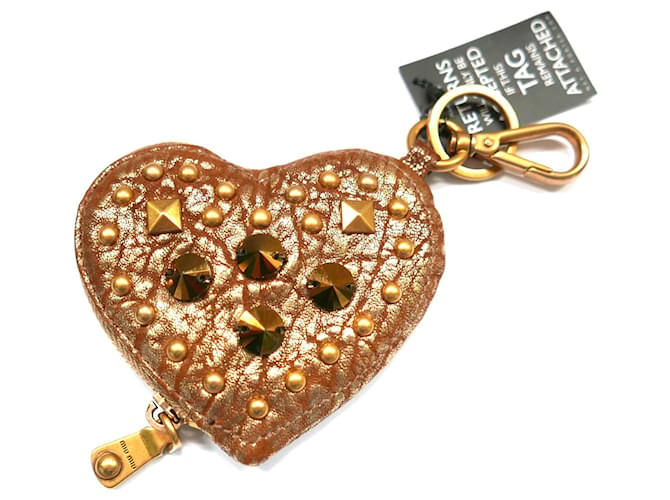 Miu Miu porta moedas em forma de coração cravejado de ouro Dourado Couro  ref.802560