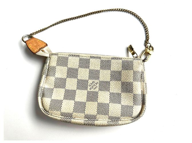 Louis Vuitton Mini accessori per pochette Blu 
