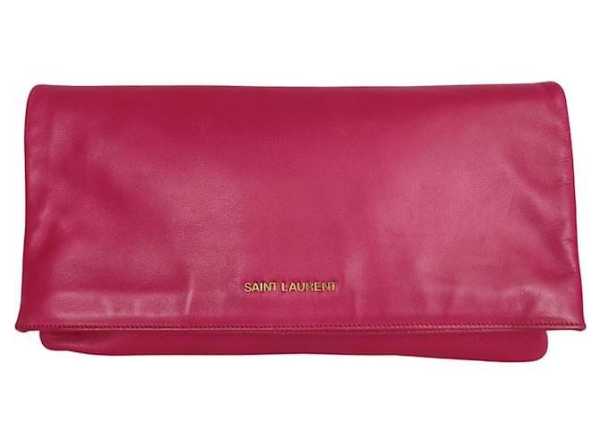 Saint Laurent maxi clutch bag in fuchsia leather with golden metal inserts Pink  ref.806026