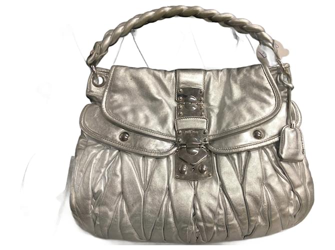 Miu Miu Metallic Matelasse Coffer Handbag Silvery Leather Pony-style calfskin  ref.806139