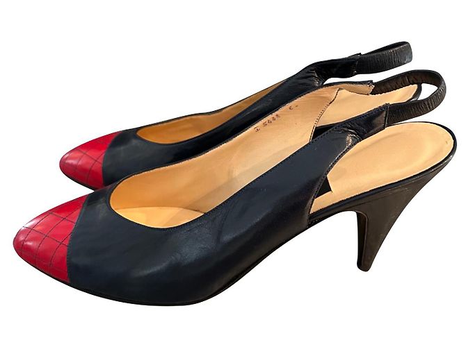 Autre Marque Navy blue leather pumps with red tips