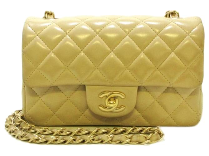 Chanel Mini matelassê Bege Pele de cordeiro  ref.810340