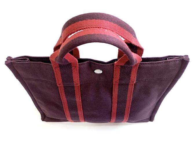Toto Bag Hermès Handbags Dark red Cloth  ref.817375