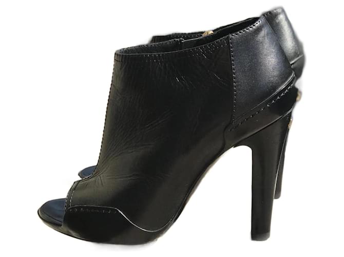 CHANEL  Ankle boots T.eu 36 Leather Black  ref.822603