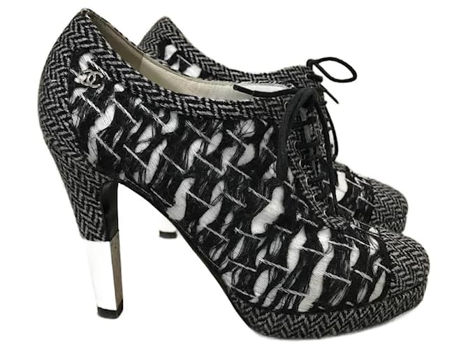 CHANEL  Ankle boots T.eu 37.5 tweed Black  ref.827410