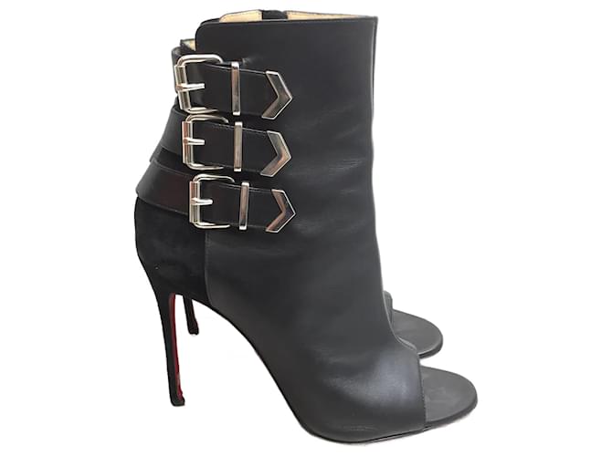 CHRISTIAN LOUBOUTIN  Ankle boots T.eu 38 Leather Black  ref.827703