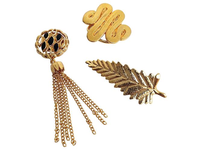 Conjunto compuesto por tres joyas vintage Dorado