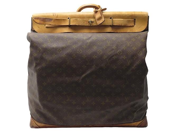  Louis Vuitton: Large vintage travel bag of monogram  canvas