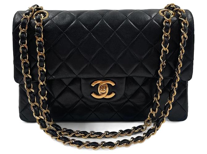Bolso pequeño con solapa Chanel de cuero negro  ref.831844