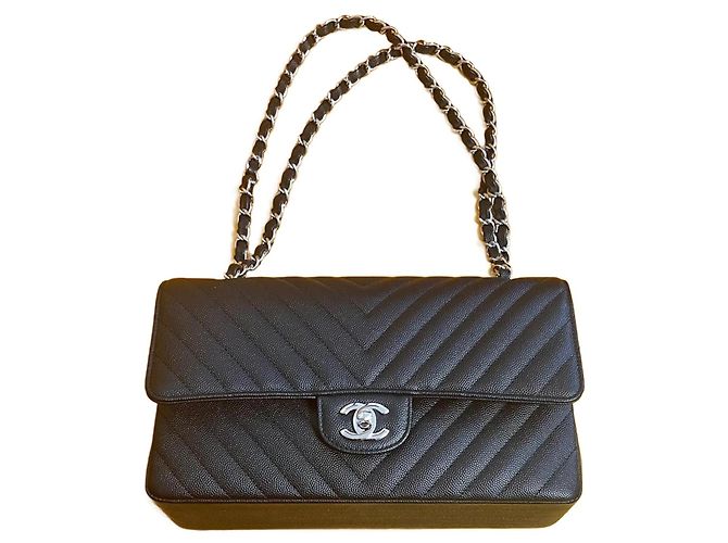 Timeless Borsa a mano Chanel Chevron in pelle caviar nera Nero