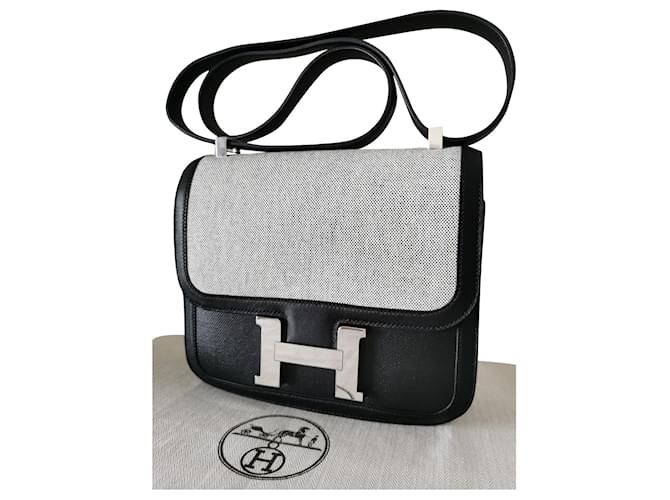 HERMÈS Limited Edition Constance 24 Bi-material Black Beige Leather Cloth  ref.843276