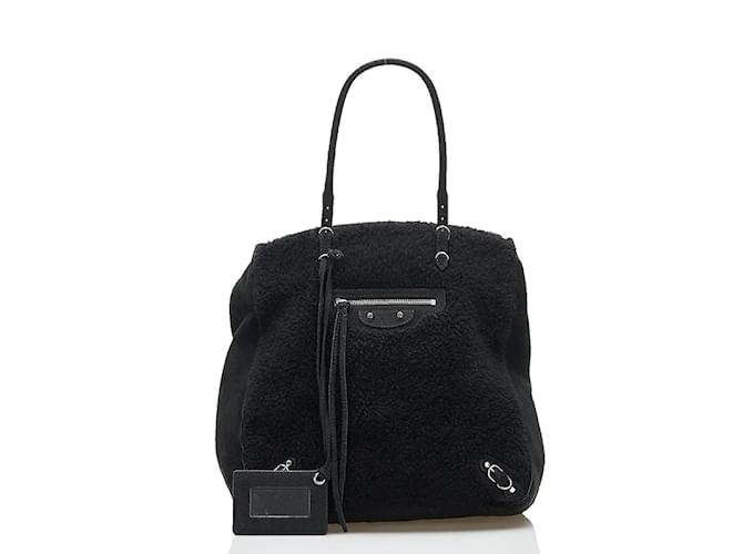 Borsa tote in pelle shearling Balenciaga nera in ottime condizioni Nero  ref.848949