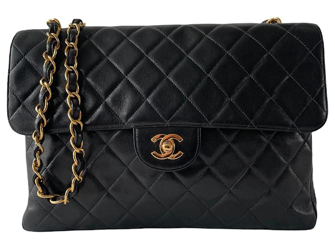 CHANEL jumbo double flap bag in black quilted smooth lamb leather