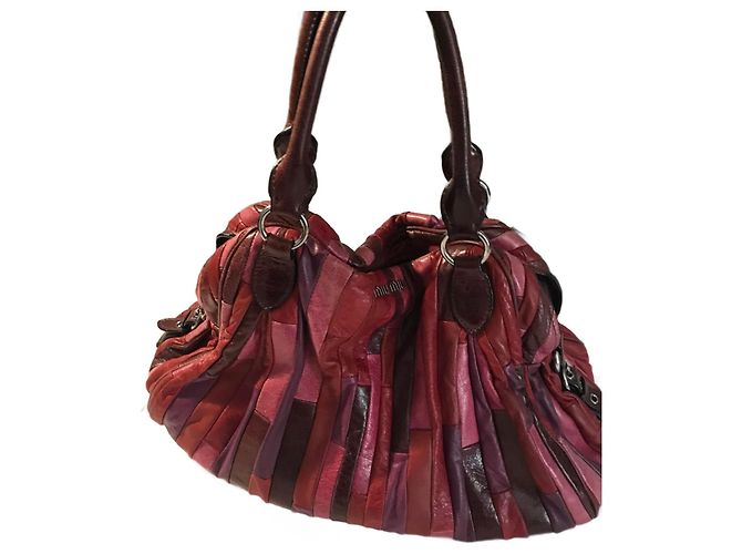 Bolsa Miu Miu de couro fúcsia e berinjela