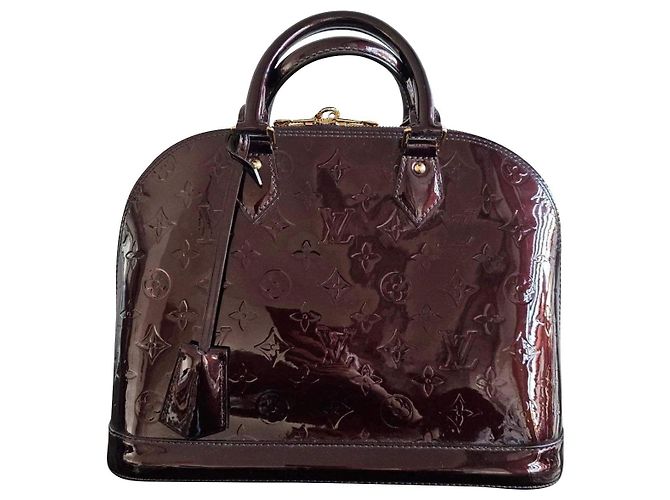 Louis Vuitton Bolsa Alma em Couro Vernis Amarante