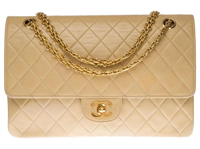 Mademoiselle Chanel Timeless shoulder bag/CLASSIC lined FLAP IN BEIGE QUILTED LEATHER - 1212621321  ref.855376
