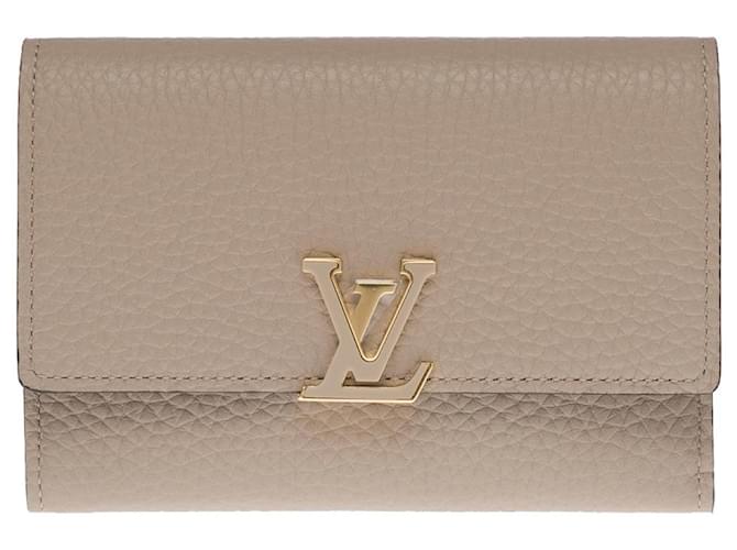 LOUIS VUITTON CAPUCINES COMPACT WALLET IN PEBBLE GRAY TAURILLON LEATHER  ref.855538