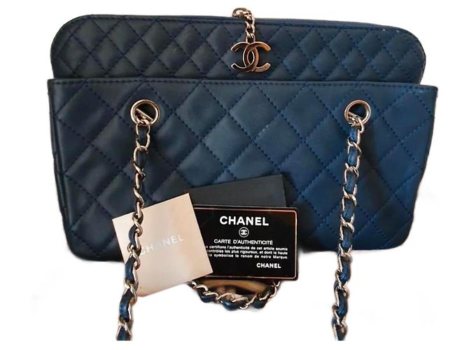 Camera Bolsa de mão Chanel de couro azul