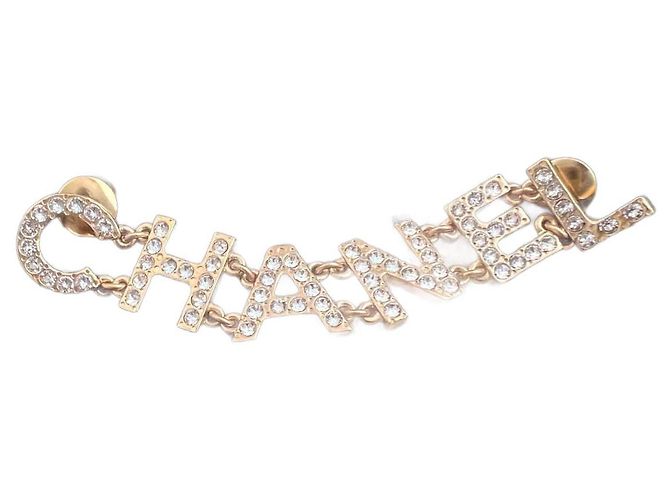 Cambon Broche Chanel em Aço Dourado e Strass