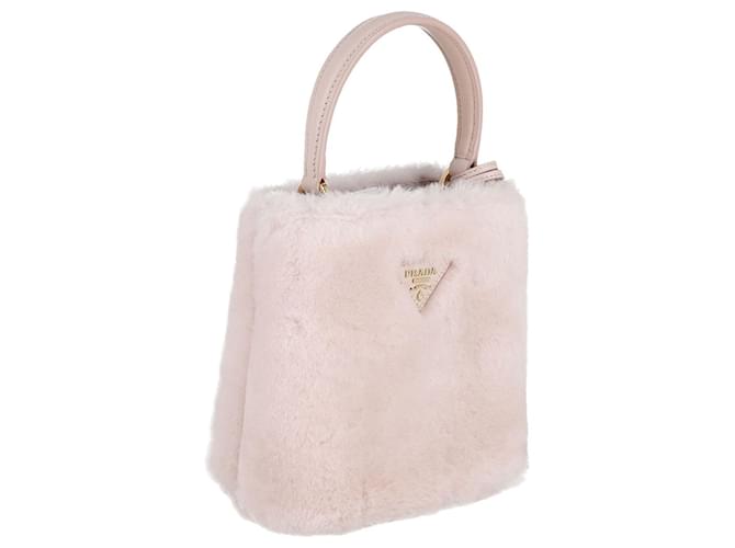 Prada Panier Mini-Tasche aus rosa Shearling Pink Leder  ref.870531