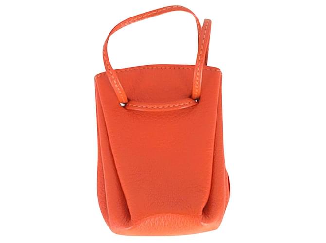Hermès Hermes Vespa Mini bolsa con cordón en cuero naranja  ref.870536