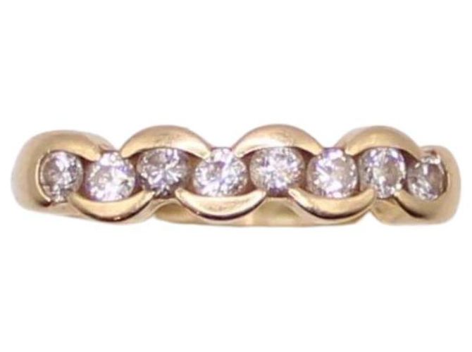 Autre Marque Anel meia volta com diamantes em ouro 750%O