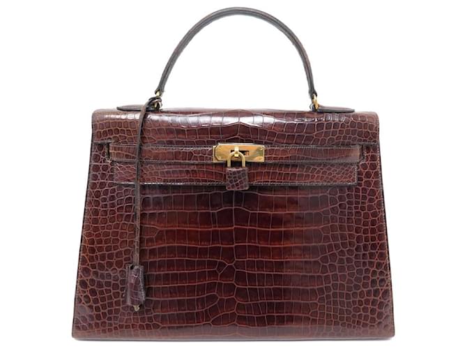 Hermès VINTAGE HERMES KELLY HANDBAG 32 SELLIER IN BROWN CROCODILE LEATHER HAND BAG Exotic leather  ref.881657