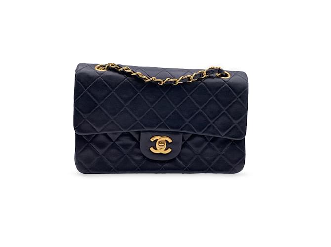 Chanel Vintage Black Quilted Timeless Classic Small 2.55 bag 23 cm Leather  ref.885500 - Joli Closet