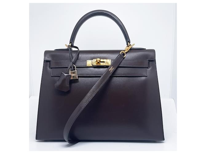 Hermès Kelly saddler 32 cm in brown box Dark brown Leather  ref.888185