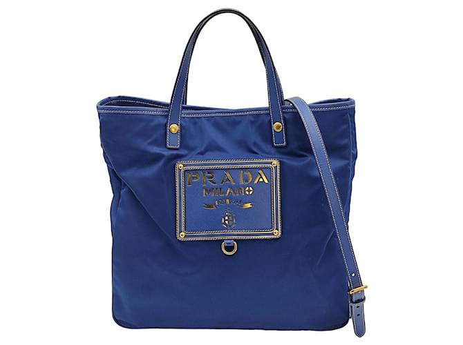 Prada tote shoulder bag in light blue nylon with gold logo Cloth  ref.888630