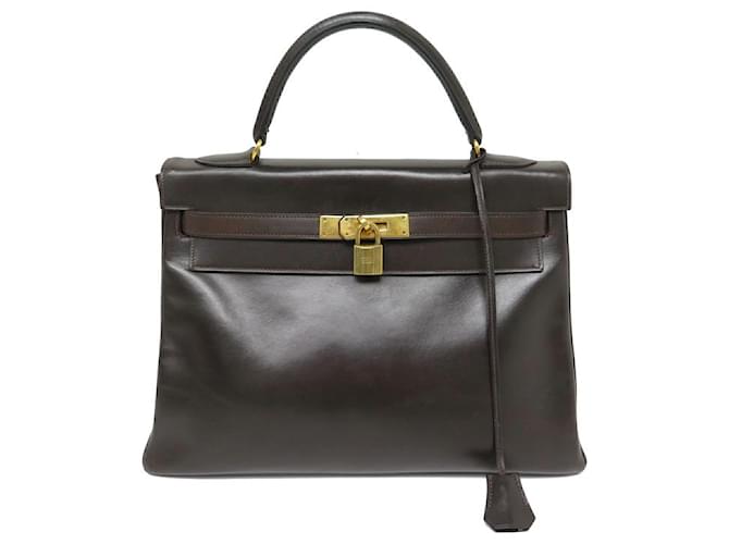 Hermès VINTAGE SAC A MAIN HERMES KELLY 32 RETOURNE EN CUIR BOX MARRON PURSE HAND BAG  ref.894605