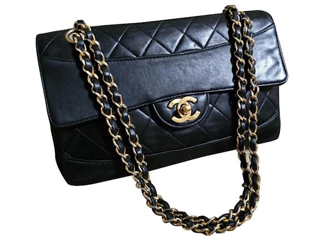 Timeless Vintage Chanel . Schwarz Golden Leder  ref.897595