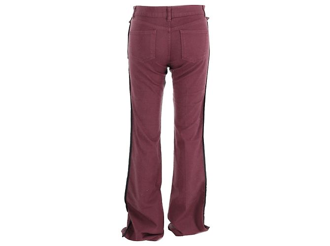 Vaqueros Alexander McQueen acampanados en algodón burdeos Roja