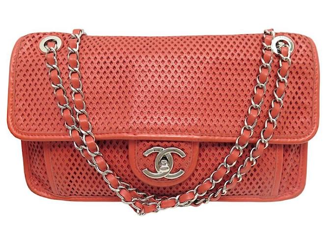 CHANEL UP IN THE AIR PERFORATED TIMELESS A HANDBAG67652 RED LEATHER BAG  ref.902086 - Joli Closet