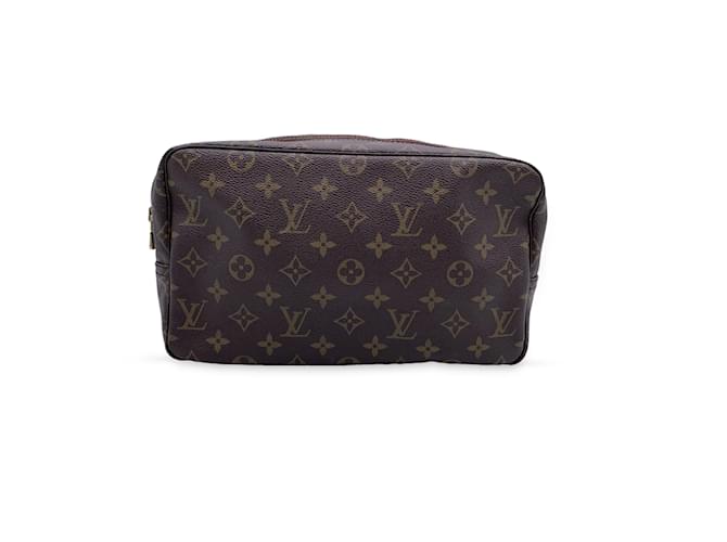 Trousse de toilette leather travel bag Louis Vuitton Brown in