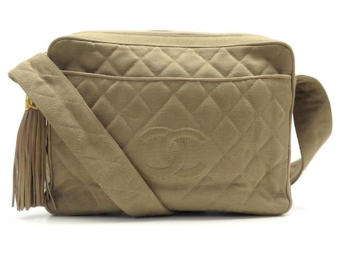 SAC A MAIN CHANEL CAMERA LOGO CC POMPON BANDOULIERE EN TOILE BEIGE HANBAG  ref.909410