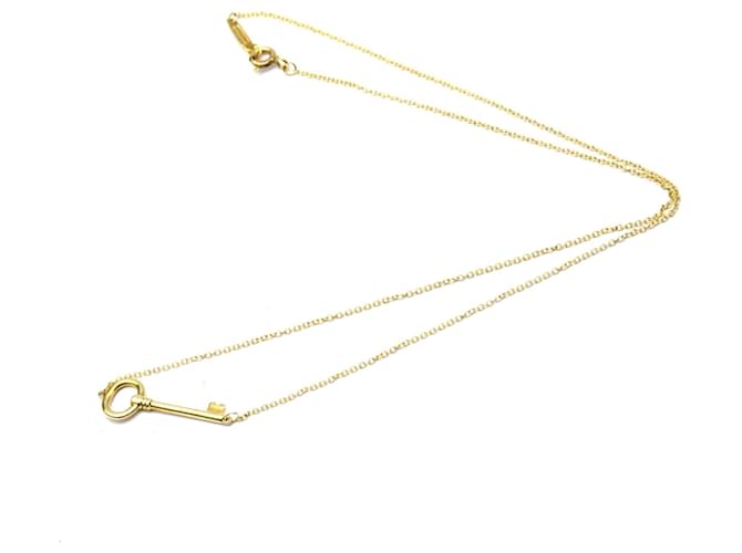 Tiffany & Co Clé ovale Golden Gelbes Gold  ref.915055