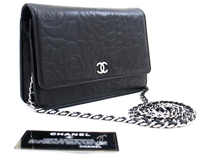 CHANEL Black Camellia Embossed Wallet On Chain WOC Umhängetasche Schwarz Leder  ref.920371