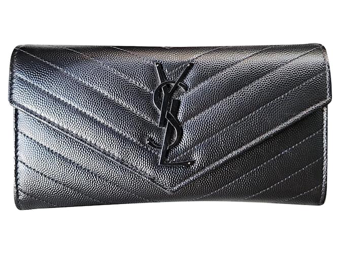 Splendido e raffinato portafoglio di Yves Saint Laurent in pelle martellata Nero  ref.922366