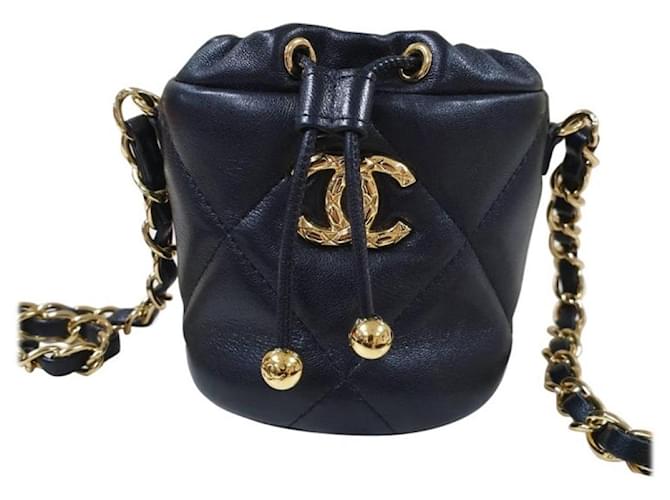 Bolso Chanel Mini Bucket Fluffy Chain Black Lambskin Gold Hardware Bag Negro Cuero  ref.927583