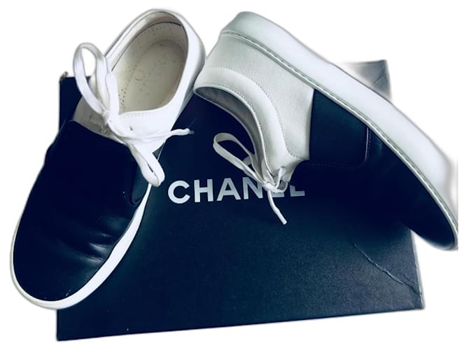 Chanel Slip on Black and White Trainers Leather  ref.929431