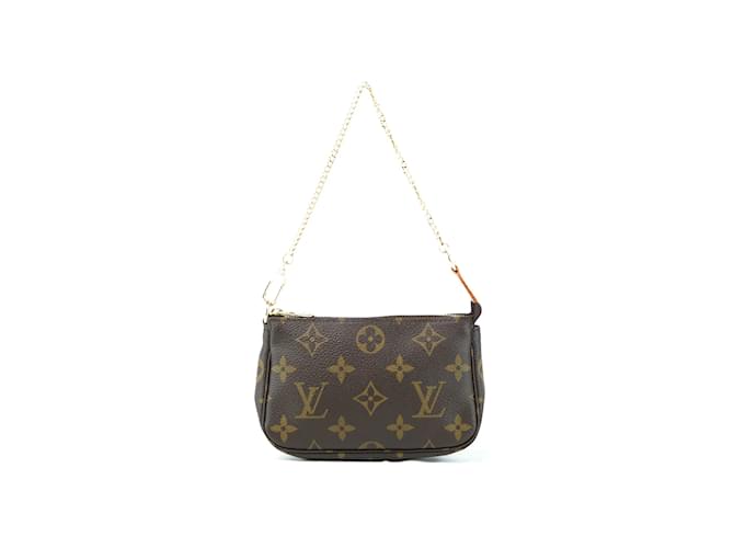 Pochette accessoire cloth handbag Louis Vuitton Brown in Cloth